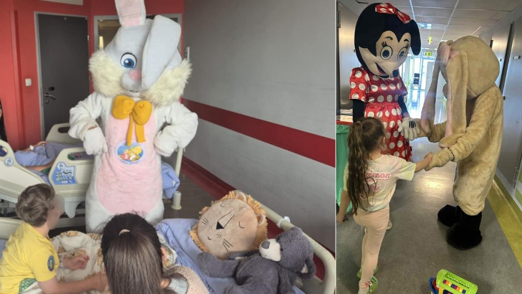 Wolontariusze przebrani za Myszkę Minnie i pluszowego królika rozmawiają z pacjentami i ich rodzicami